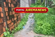 Moradores denunciam rua tomada por lama e correnteza no bairro Iparana, em Caucaia